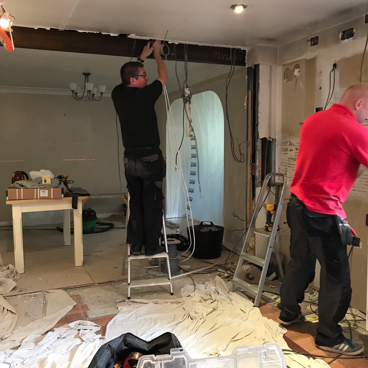 ABM Interiors team working on kitchen installation